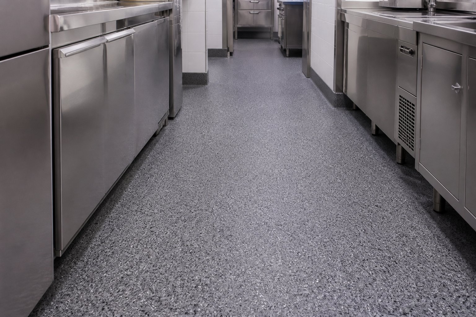 Decorative quartz floor system in a clean commercial kitchen corridor